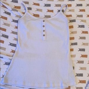 White tank top with four buttons down the front